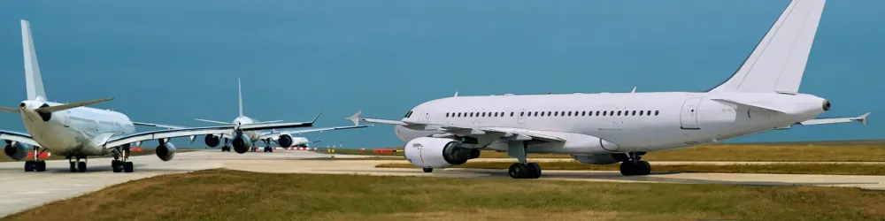 Heavy traffic of airplanes. Busy airport.